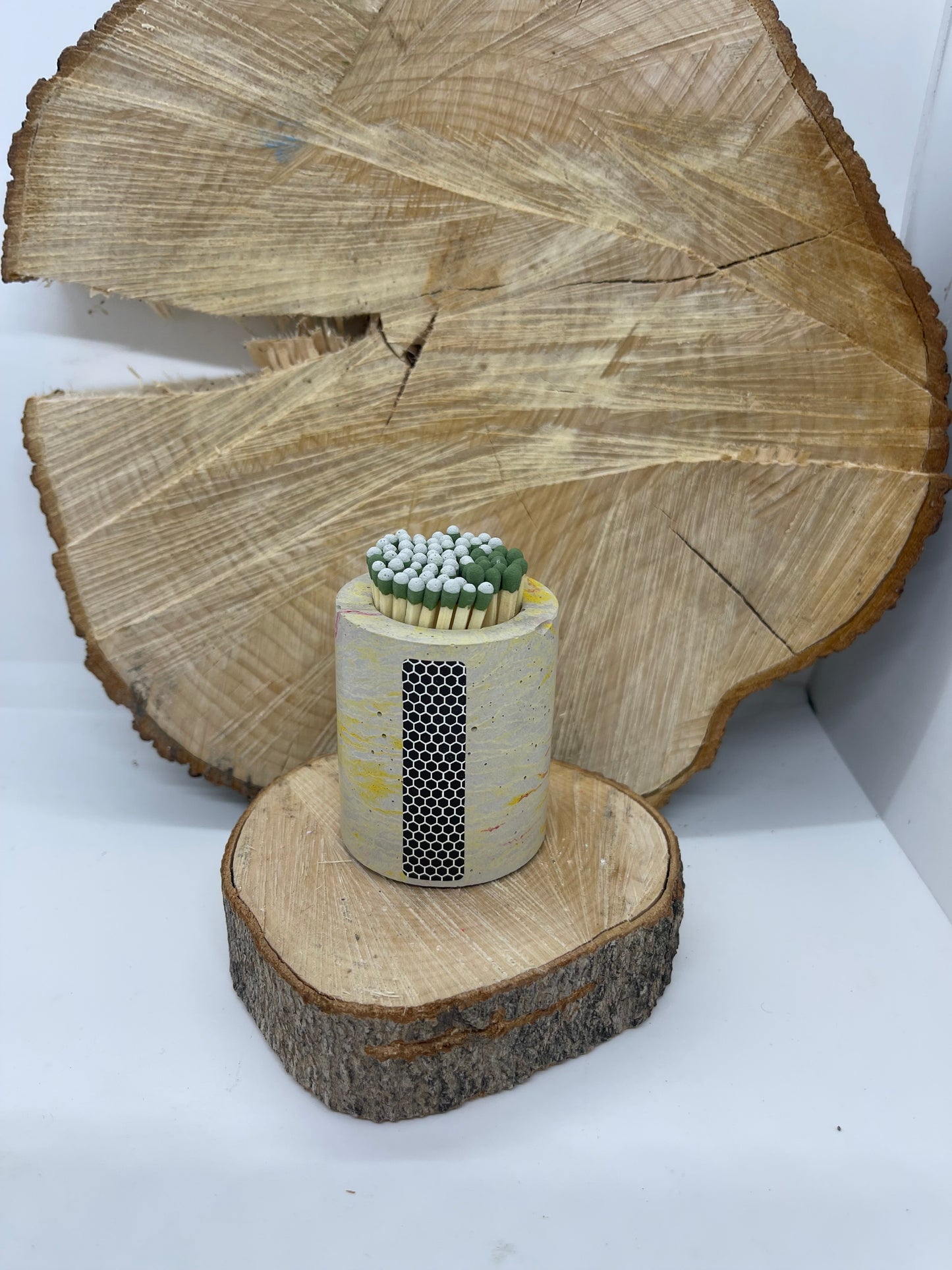 Concrete Match holder with striker pad